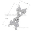 white gold plated ribbon shape CZ micro pave custom hinged jewelry clasp